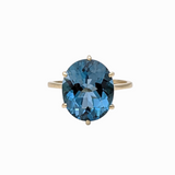 London Blue Topaz Ring in Oval Setting 12x10mm in 14k White Gold, Rose Gold, and Yellow Gold | London Blue Topaz | December Birthstone