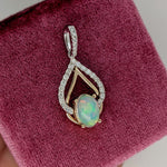 Pendants-Multi Color Ethiopian Opal Pendant in 14K Solid Gold W Diamond Accents & Diamond Studded Bail | Oval 9x7mm | Play of Fire | Customizable - NNJGemstones