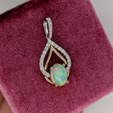 Pendants-Multi Color Ethiopian Opal Pendant in 14K Solid Gold W Diamond Accents & Diamond Studded Bail | Oval 9x7mm | Play of Fire | Customizable - NNJGemstones