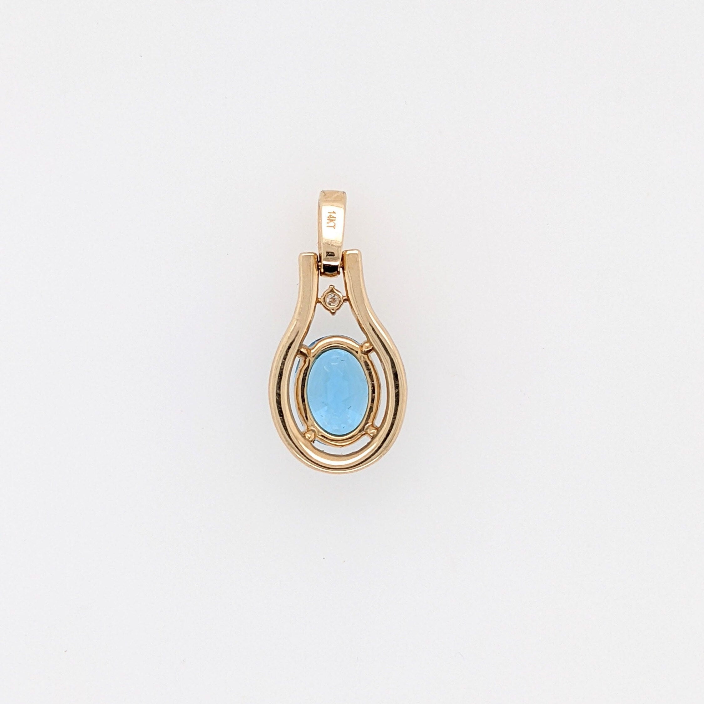 Pendants-Pretty Swiss Topaz Pendant in Solid 14K Yellow Gold with Diamond Accents | Oval 9x7mm | December Birthstone | Blue Gemstone | Ready to Ship - NNJGemstones