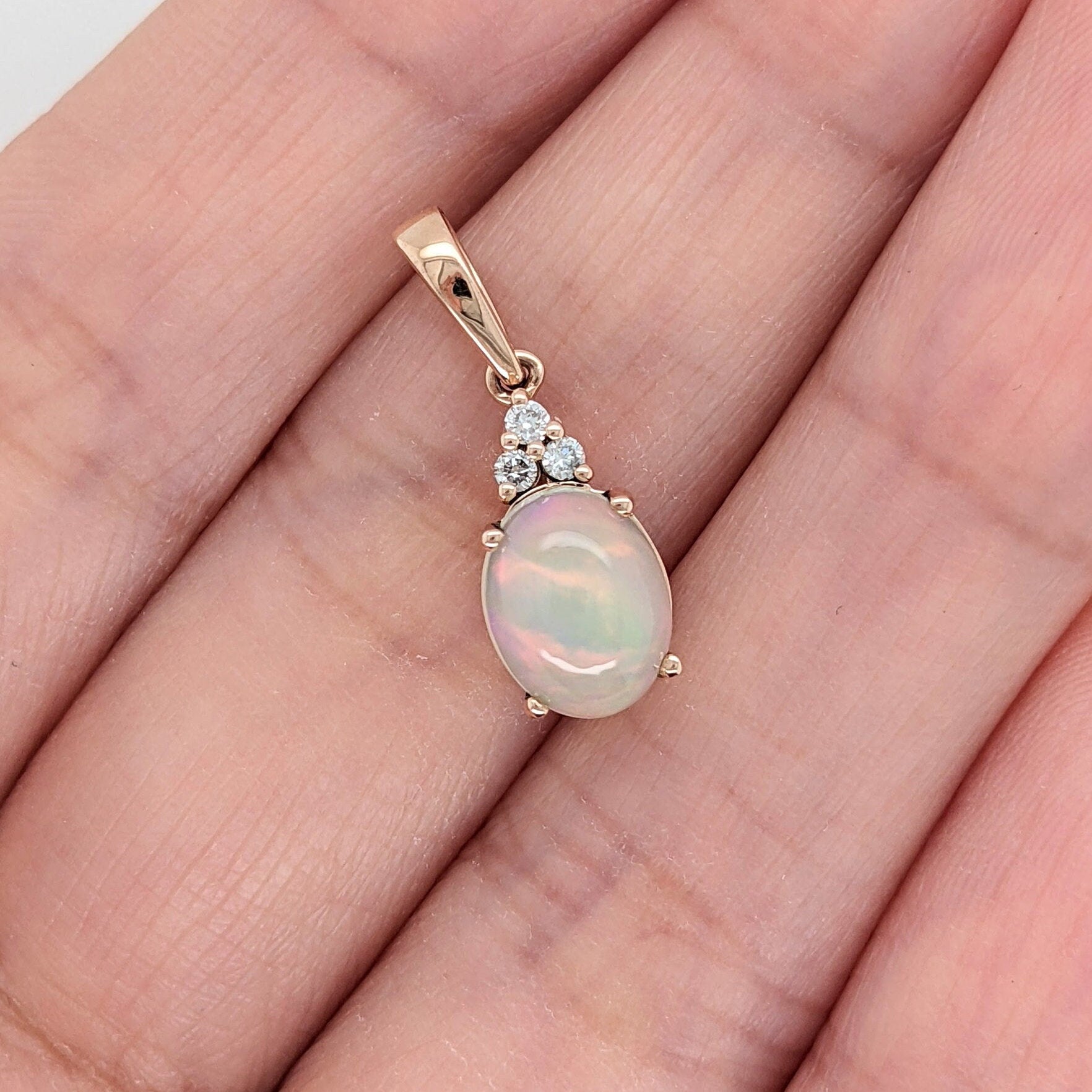 Pendants-Stunning Rainbow Color Opal Pendant in Solid 14K Gold with Natural Diamond Accents | Oval 9x7mm | October Birthstone | - NNJGemstones