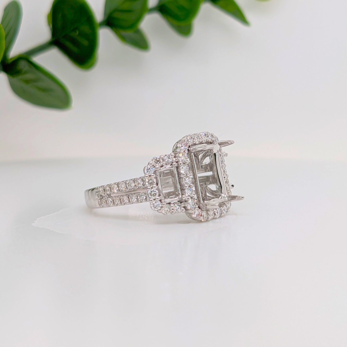 Celeste Collection | Three Stone Ring with 2 Baguette Baskets and a Center Emerald Basket with a Diamond Halo | Ring Setting in 14k Solid Gold w Pave Split Shank | Emerald Cut