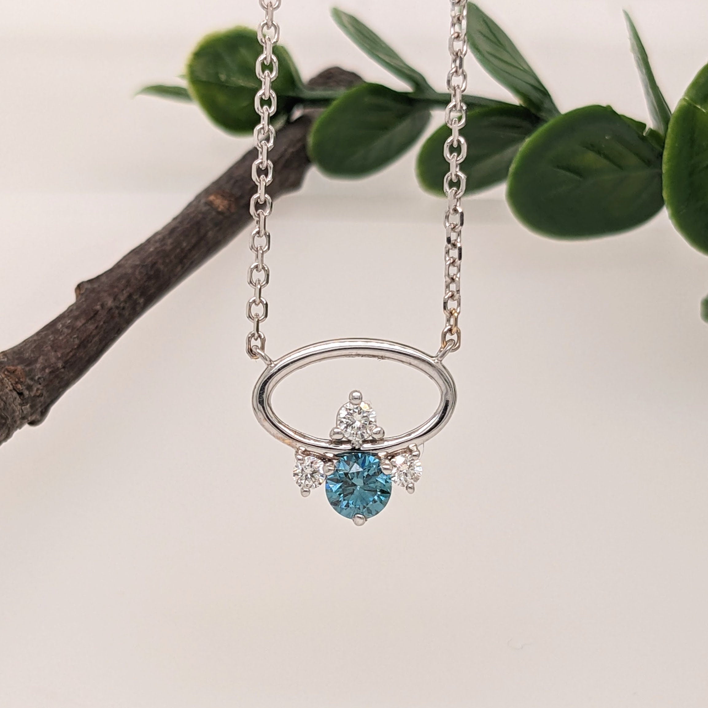 Oval Cutout Blue Diamond Pendant in Solid 14K White Gold with Natural Diamond Accents | Round 4.6mm | April Birthstone