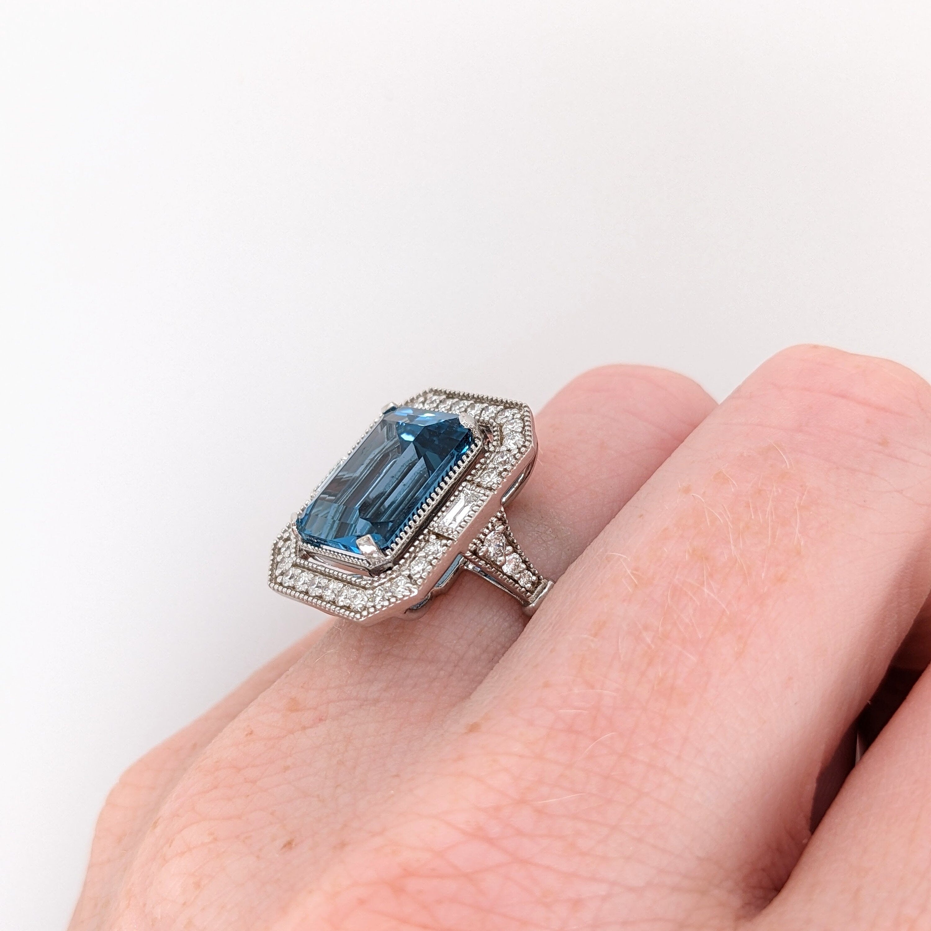 Glamorous London Blue Topaz Ring with All Natural Diamond Pave Halo in Solid 14K White Gold | Emerald Cut 12x10mm | December Birthstone