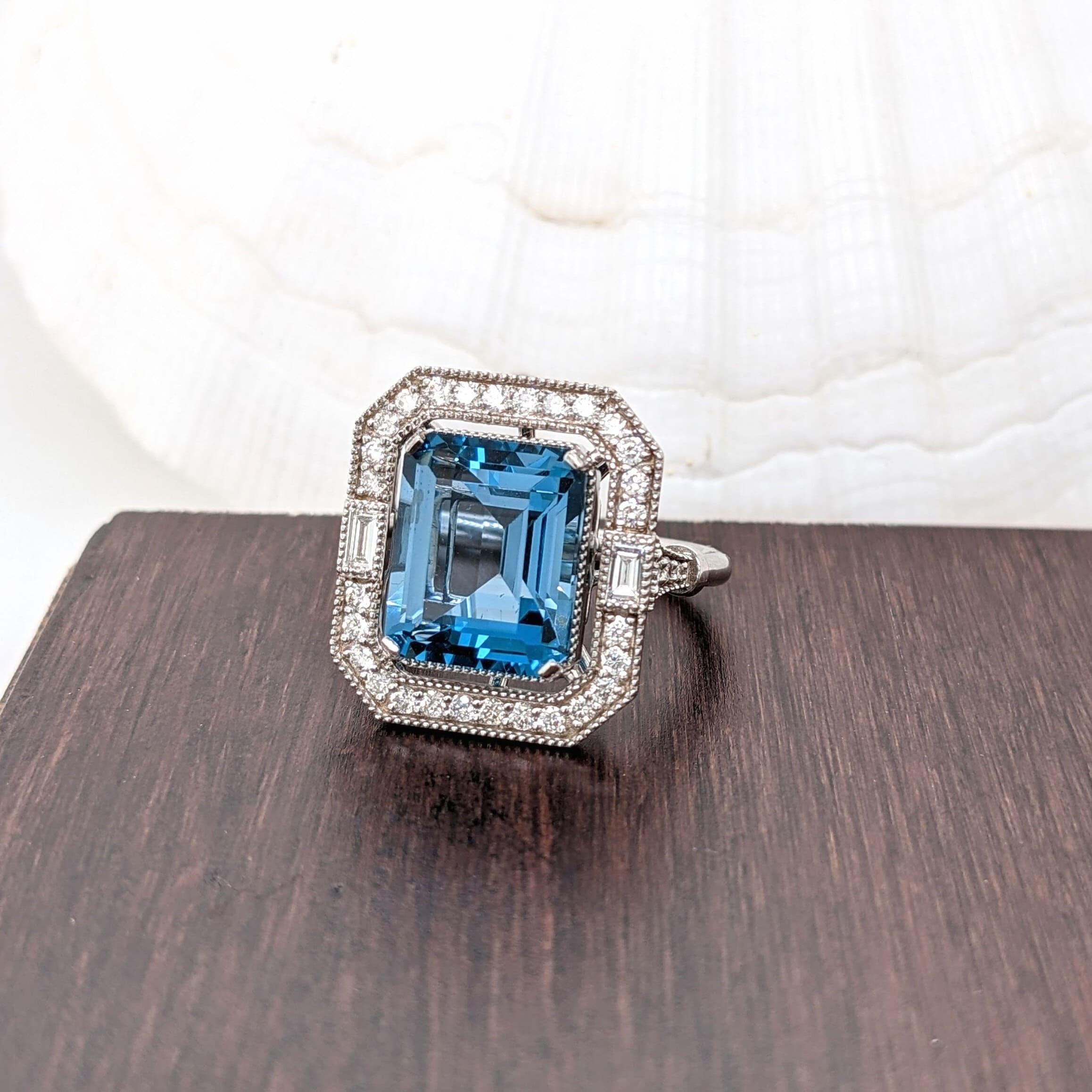 Glamorous London Blue Topaz Ring with All Natural Diamond Pave Halo in Solid 14K White Gold | Emerald Cut 12x10mm | December Birthstone