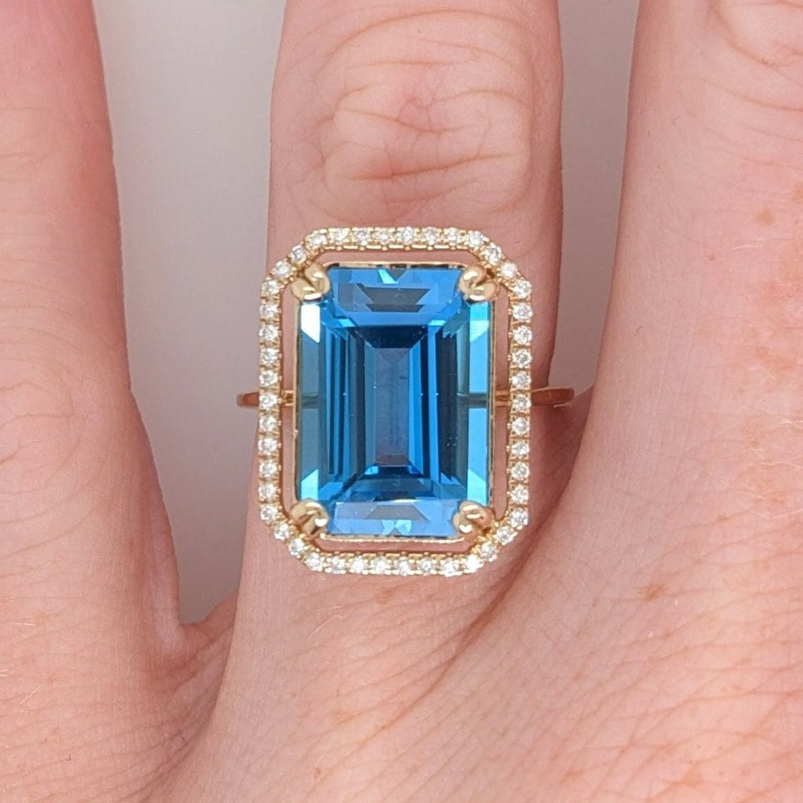 Swiss Blue Topaz Statement Ring w an All Natural Diamond Halo in Solid 14K Yellow Gold | Emerald Cut 14x10mm | December Birthday | Blue Gem