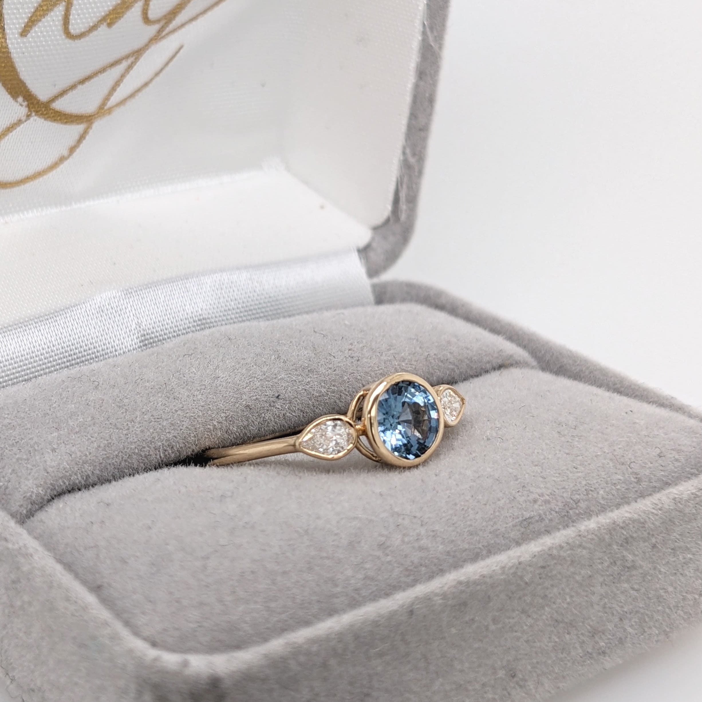 Simplistic Light Blue Sapphire Ring in 14K Yellow Gold w Natural Diamond Accents | Three Stone | Round 6mm | September Birthstone | Bezel |