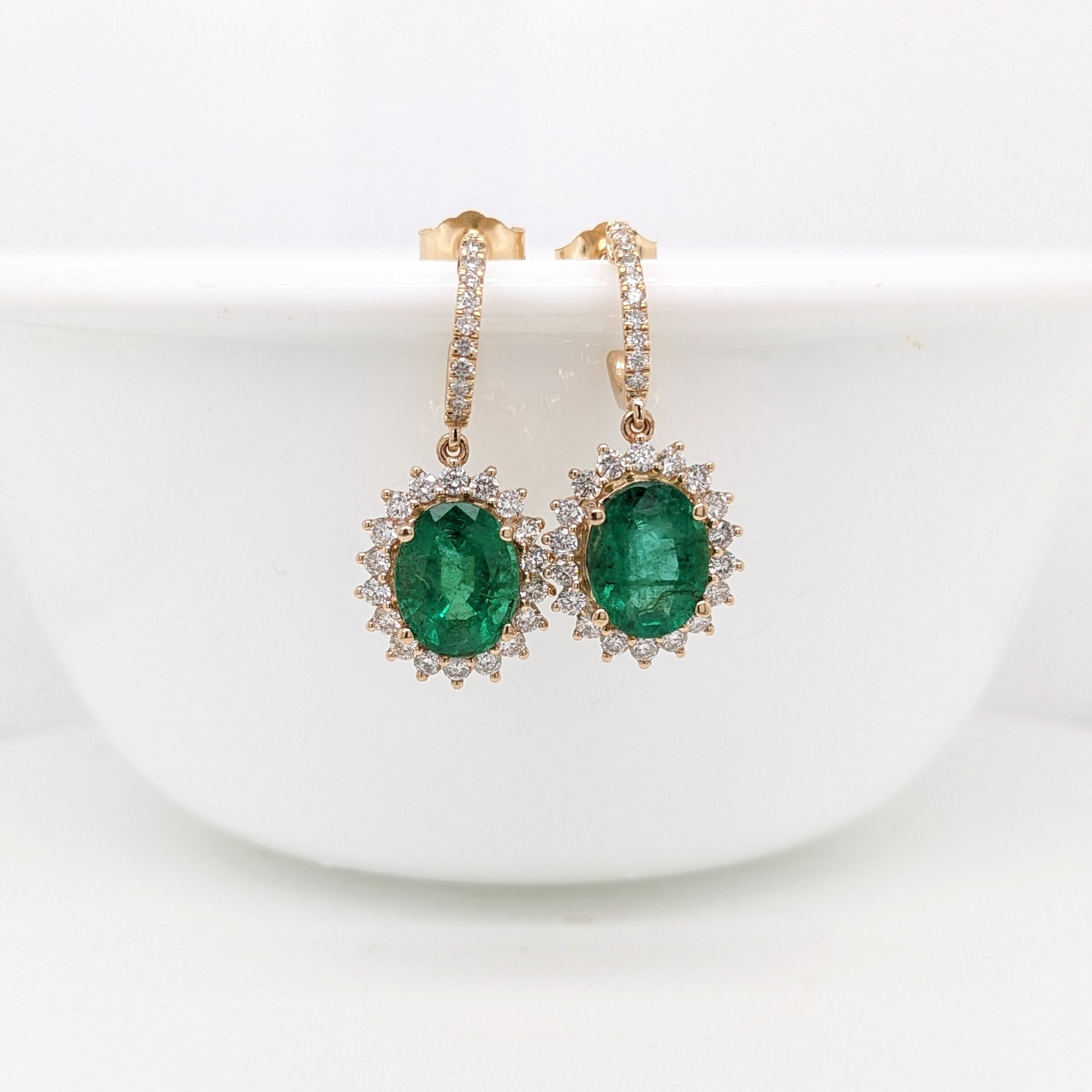 Dazzling Emerald Drop Earrings in 14k Yellow Gold w Floral Diamond Halo | Oval 9x7mm | May Birthstone | Customizable | Green Gemstone |