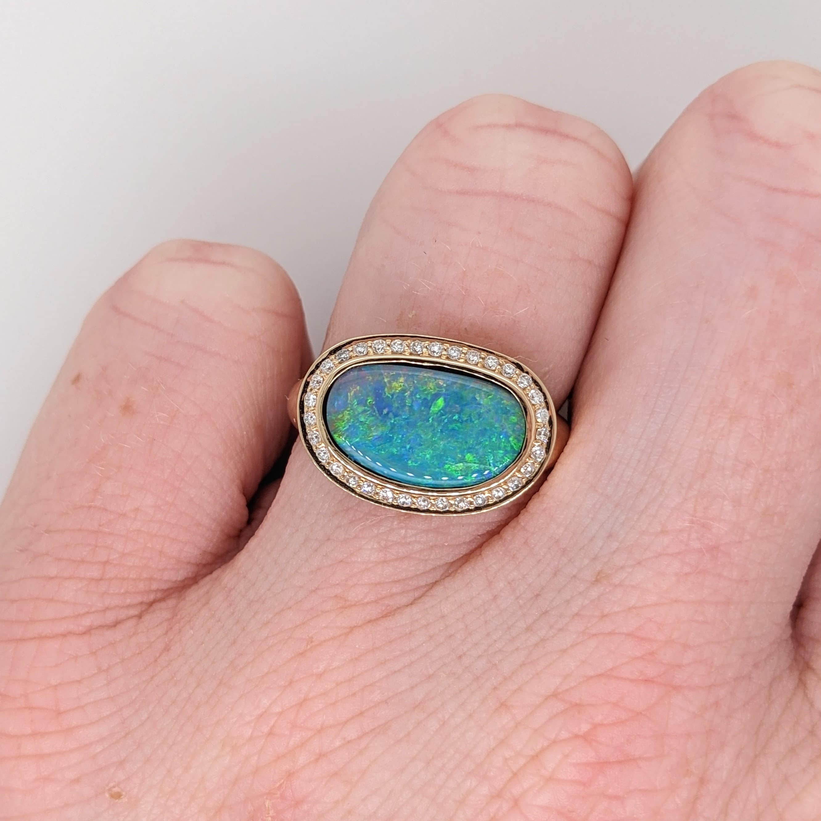 Unique Black Opal Ring Bezel Set in Solid 14k Yellow Gold with a Diamond Accented Halo | Boulder Opal Gemstone 13x7.8 | October Birthstone