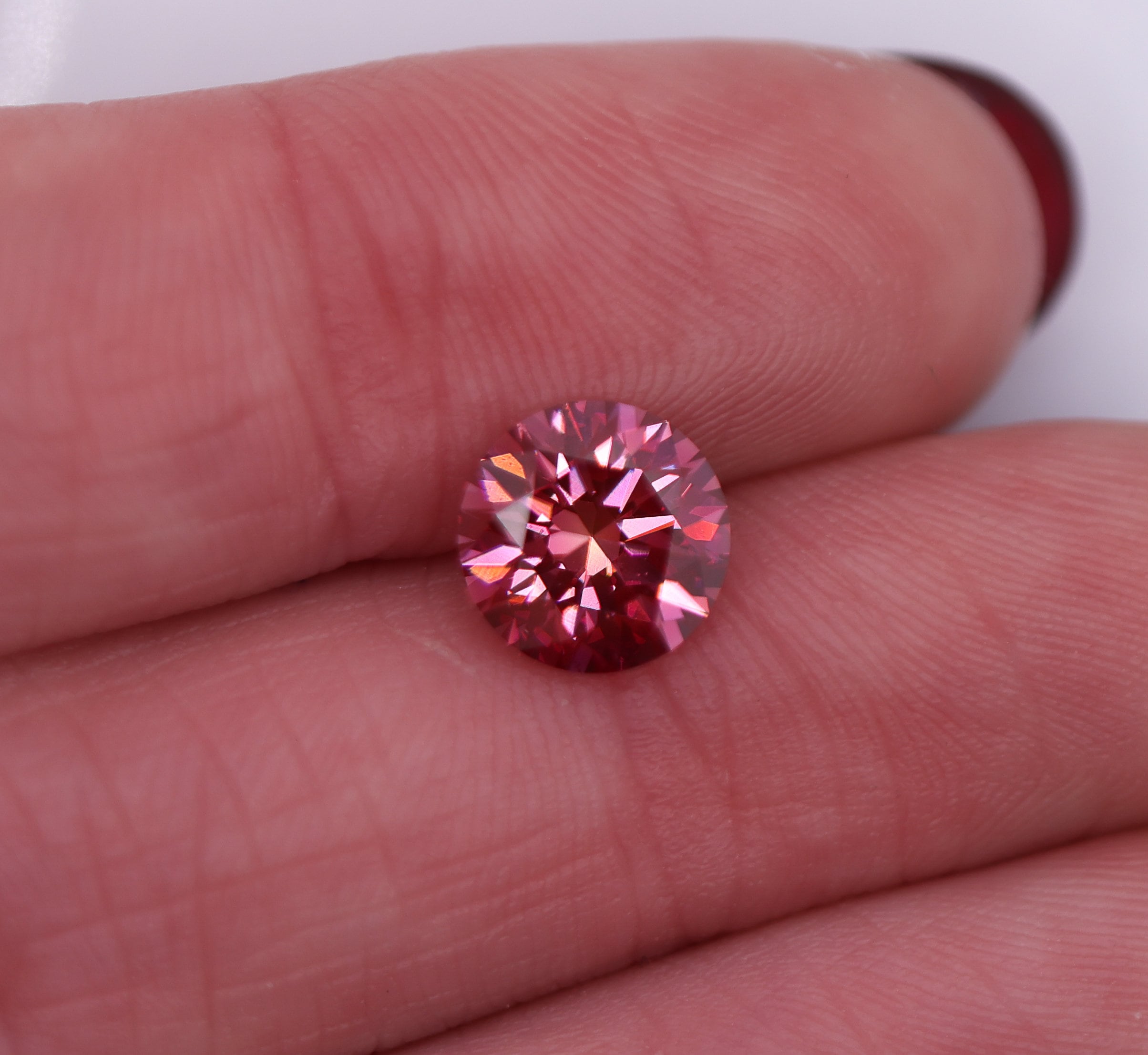 GIA Certified VVS2 Fancy Round Brilliant Cut Deep Purplish Pink Diamond